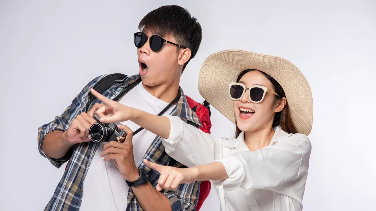 Man Woman Dressed Travel wear Glasses Take Pictures